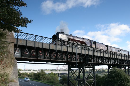 Duchess of Sutherland crossing the River Blyth at Bedlington Station, Northumberland.