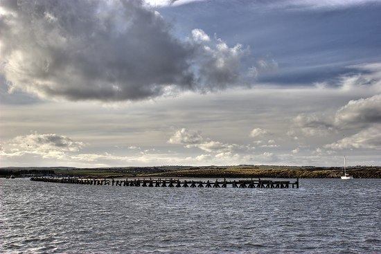 Old mooring jetties at Amble Harbour, Northumberland.