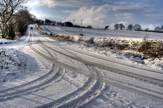 Car stuck in the snow on a winter morning at Meldon, Northumberland