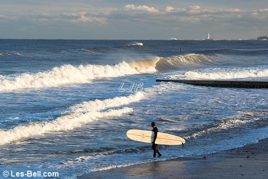 Surfer at Blyth South Beach Northumberland.