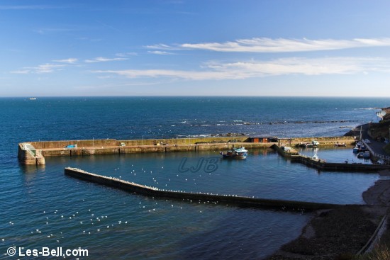 View down to the harbour from the road.