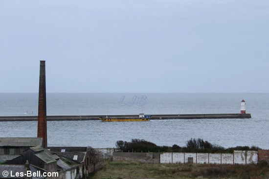 Dredger Sandsend making it's way past Spittal to Tweed Dock on a dull afternoon.
