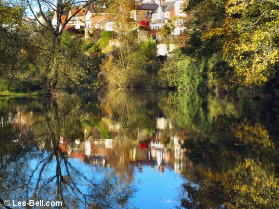 Autumn reflections in the River Wansbeck at Morpeth.