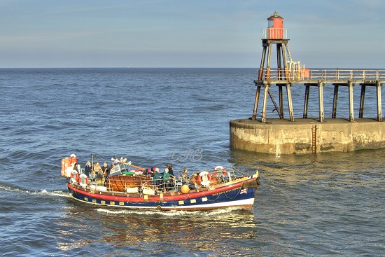 The old Whitby Lifeboat returning from a cruise.