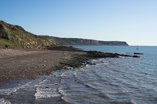 View south along the coast from Whitehaven West Pier.