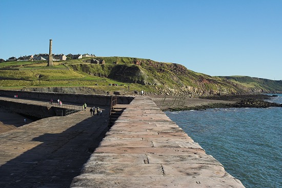 View south along the coast from Whitehaven West Pier.